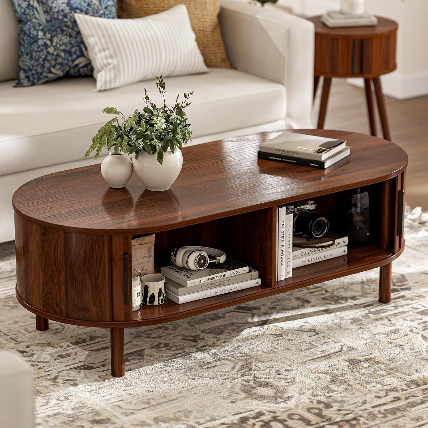 Modern Oval Coffee Table with Cabinets and Sliding Doors